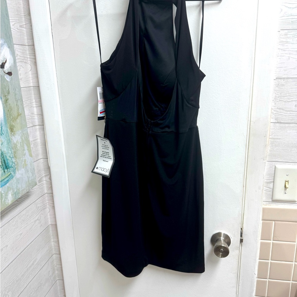 Brand new Sleeveless black cockta dress with gold stitching